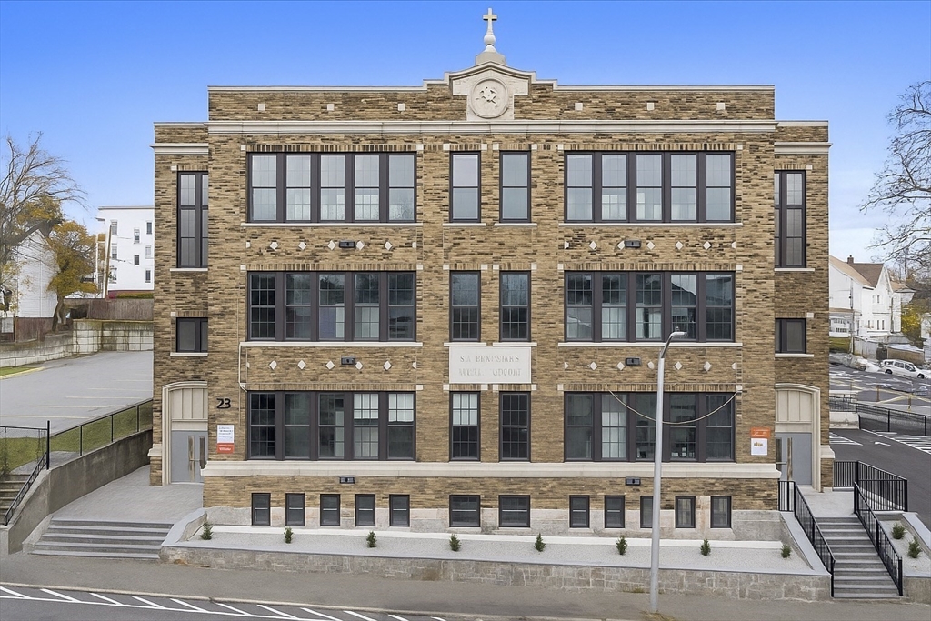 22 Waverly Street Worcester, MA 01604 - Photo 1 of 41 a front view of a building with windows