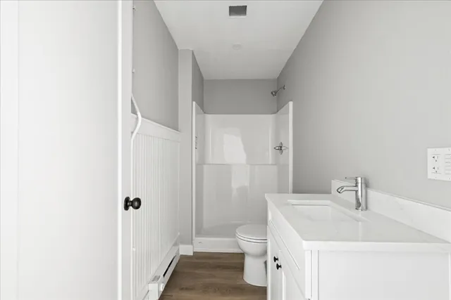 a bed room with a bed and a window