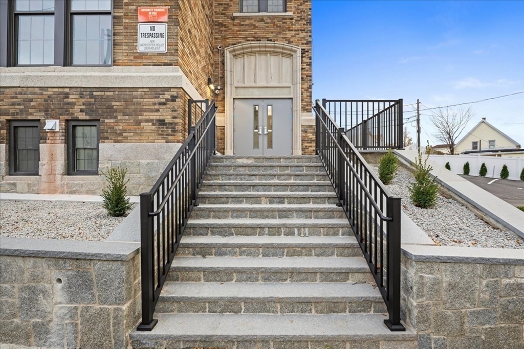 22 Waverly Street Worcester, MA 01604 - Photo 26 of 41 a view of staircase with white walls and windows