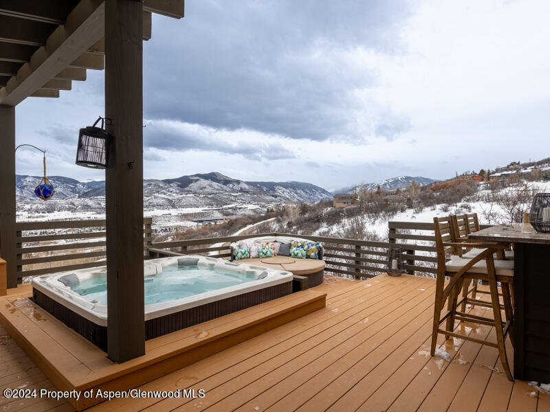 1711 Juniper Hill Road Aspen, CO 81611 - Photo 14 of 19 a view of a balcony with wooden floor