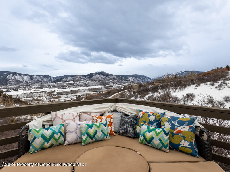 1711 Juniper Hill Road Aspen, CO 81611 - Photo 17 of 19 a view of a city from a balcony