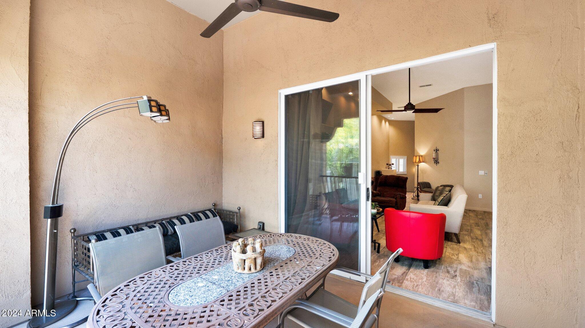 8245 East Bell Road, Unit 207 Scottsdale, AZ 85260 - Photo 22 of 33 a living room with furniture