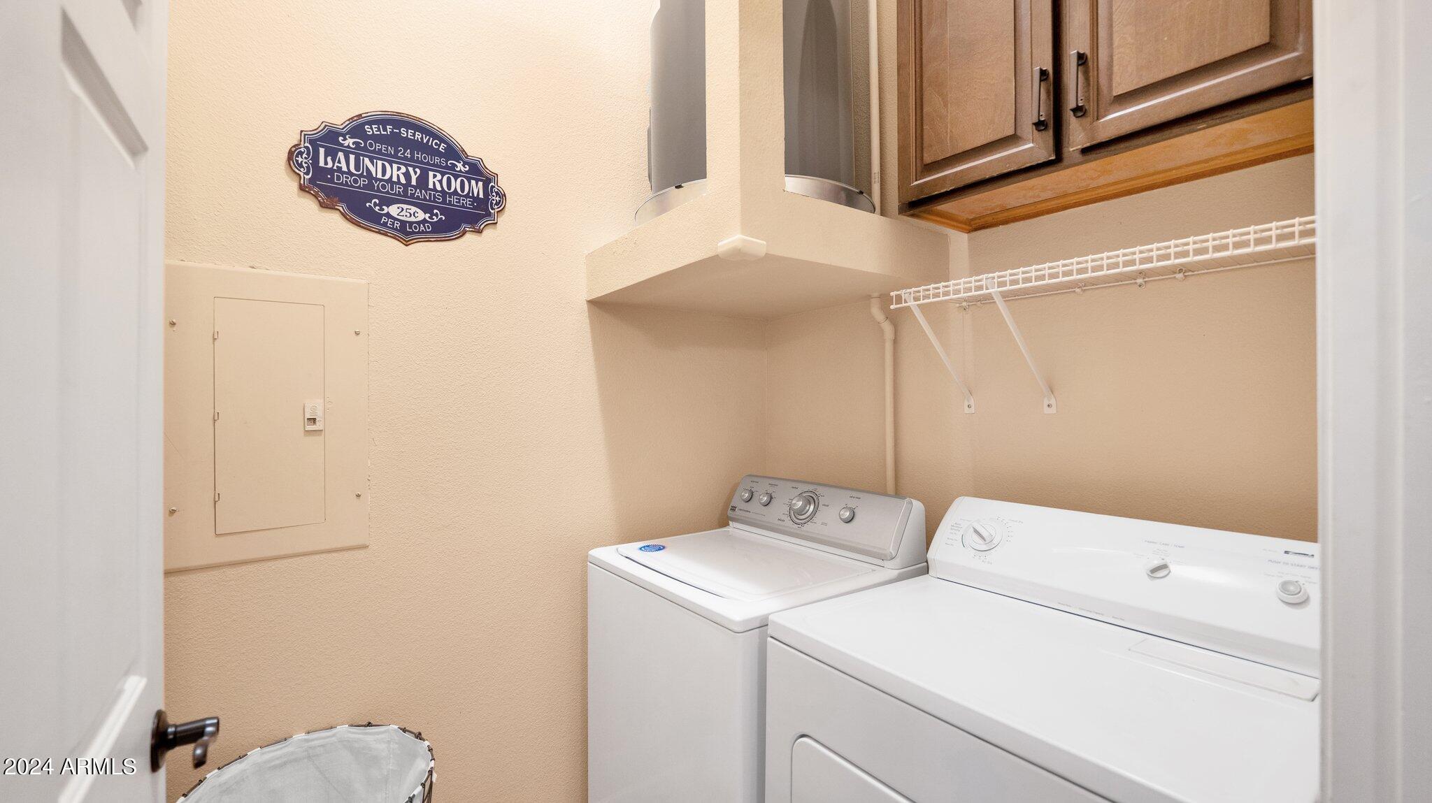 8245 East Bell Road, Unit 207 Scottsdale, AZ 85260 - Photo 24 of 33 a utility room with dryer and washer