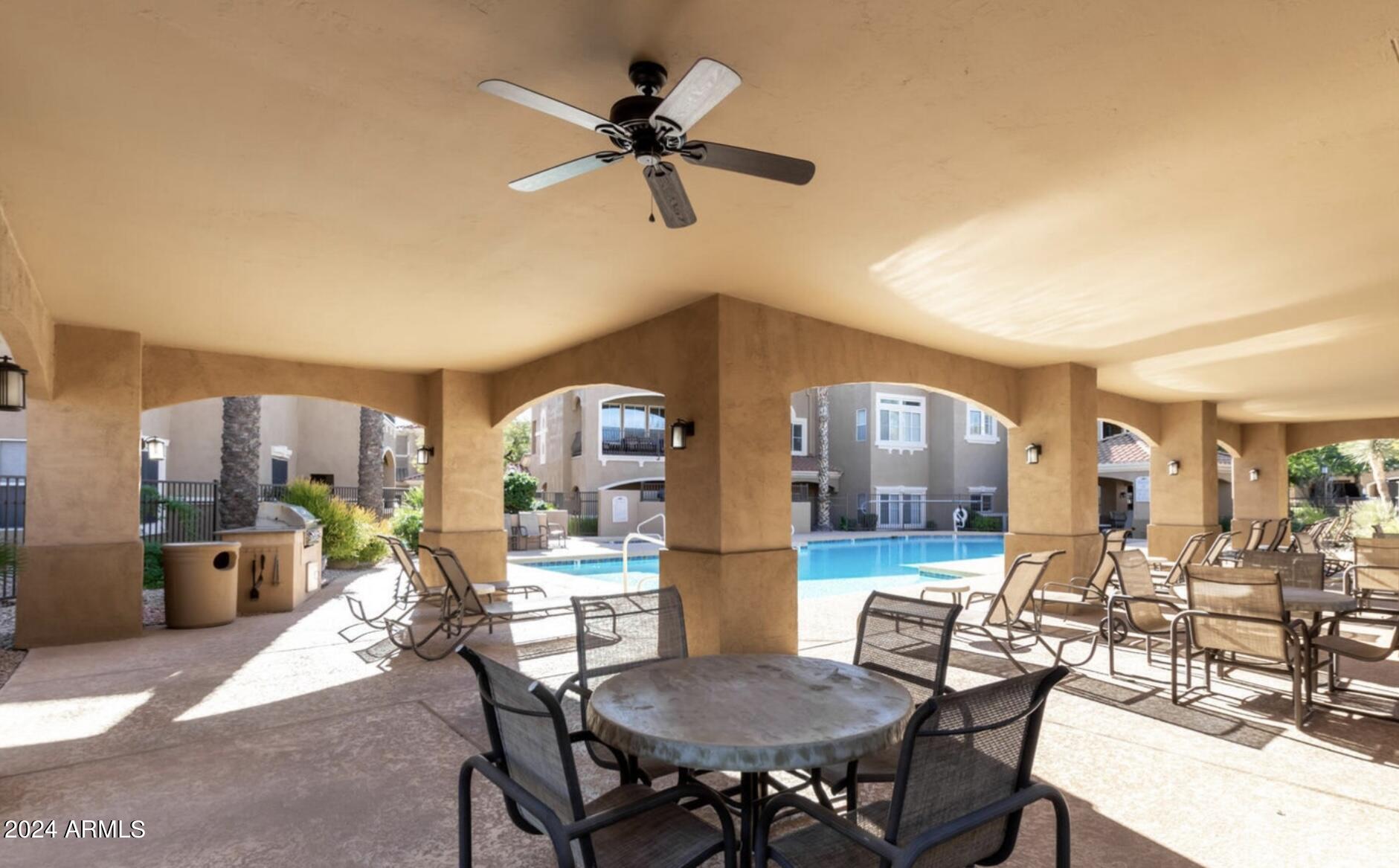 8245 East Bell Road, Unit 207 Scottsdale, AZ 85260 - Photo 27 of 33 a view of a dining room and livingroom view