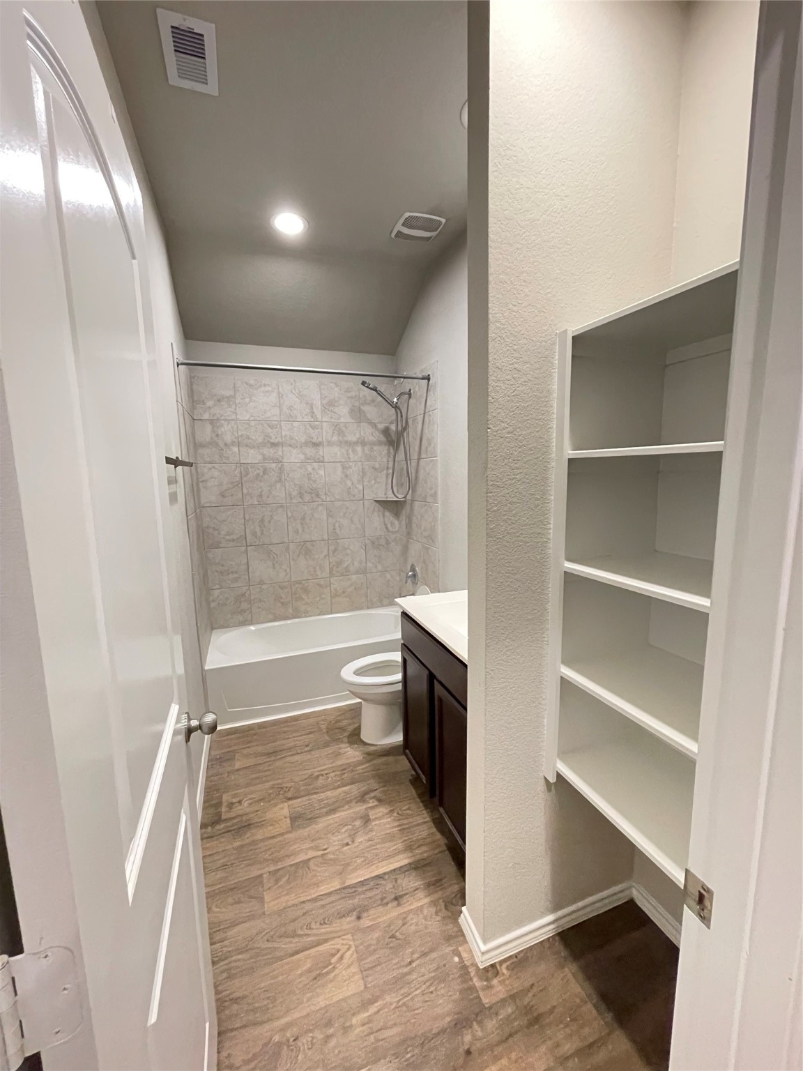 16004 Birch Bay Lane Conroe, TX 77384 - Photo 22 of 24 a bathroom with a bathtub and a shower