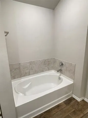 a bathroom with a bathtub