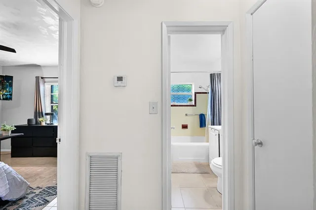 a bathroom with a sink a toilet and a bathtub