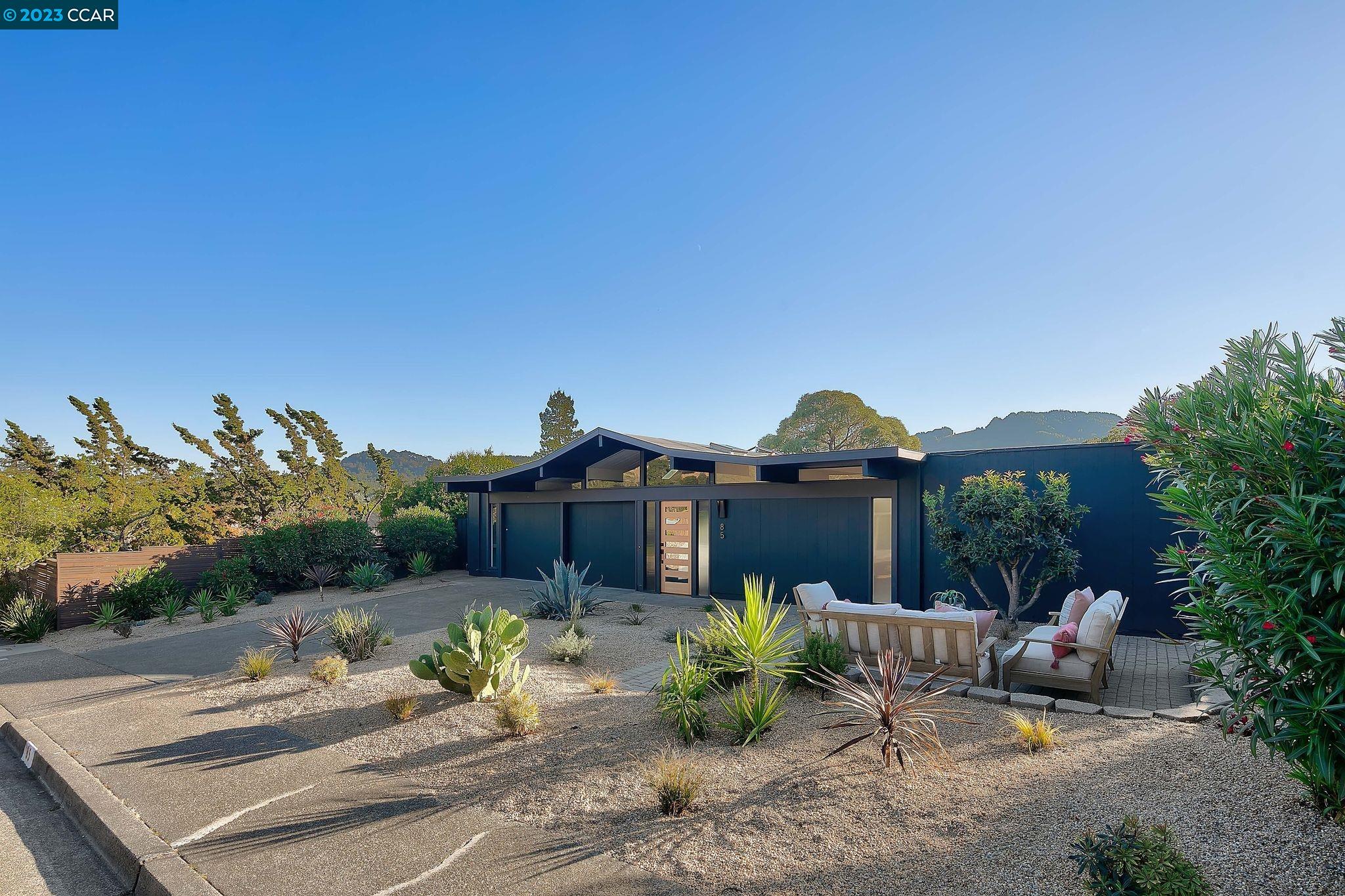 85 Mt Lassen Drive San Rafael, CA 94903 - Photo 1 of 1 a front view of a house with sitting area