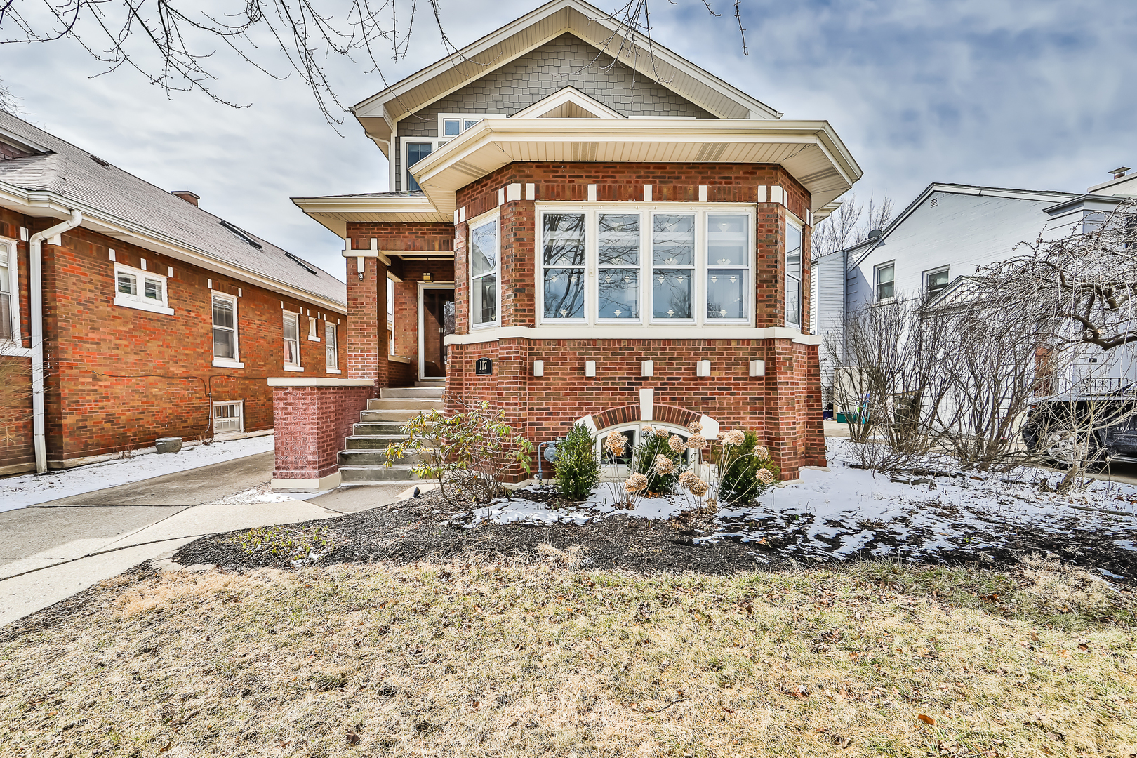 117 Southcote Road Riverside, IL 60546 - Photo 1 of 39 a front view of a house with a yard