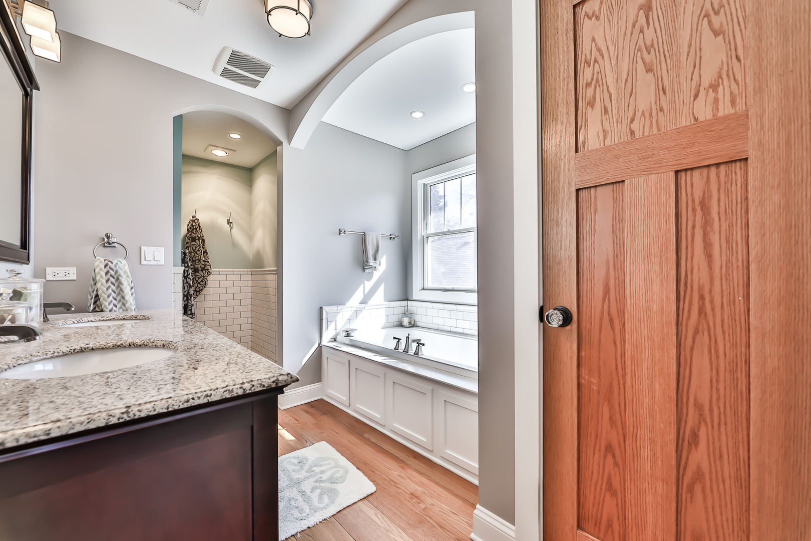 117 Southcote Road Riverside, IL 60546 - Photo 18 of 39 a en suite bathroom with a granite countertop sink and a mirror