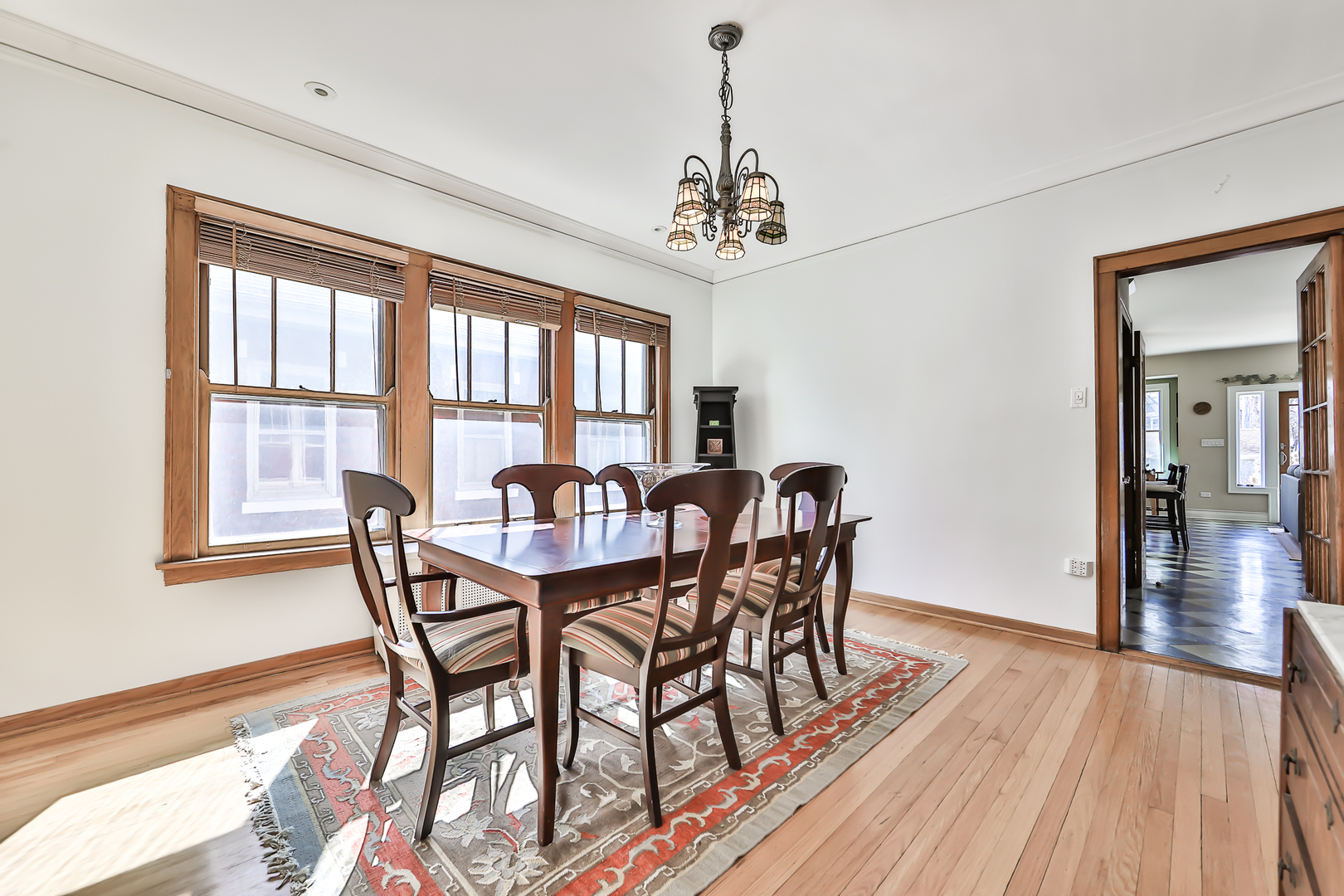 117 Southcote Road Riverside, IL 60546 - Photo 6 of 39 a view of a dining room with furniture window and wooden floor