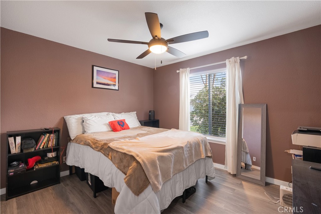 175 South 7th Street Shandon, CA 93461 - Photo 7 of 7 a bedroom with a bed and a large window