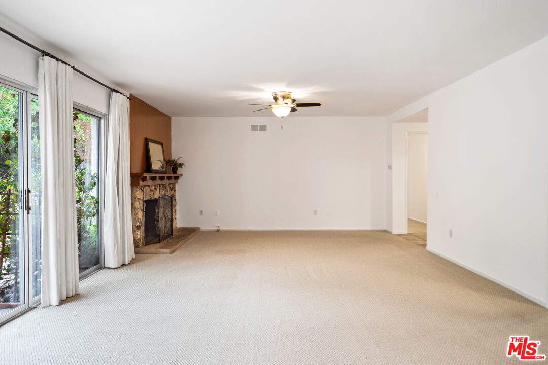 6164 Paseo Cyn Drive Malibu, CA 90265 - Photo 21 of 45 wooden floor in an empty room with a window