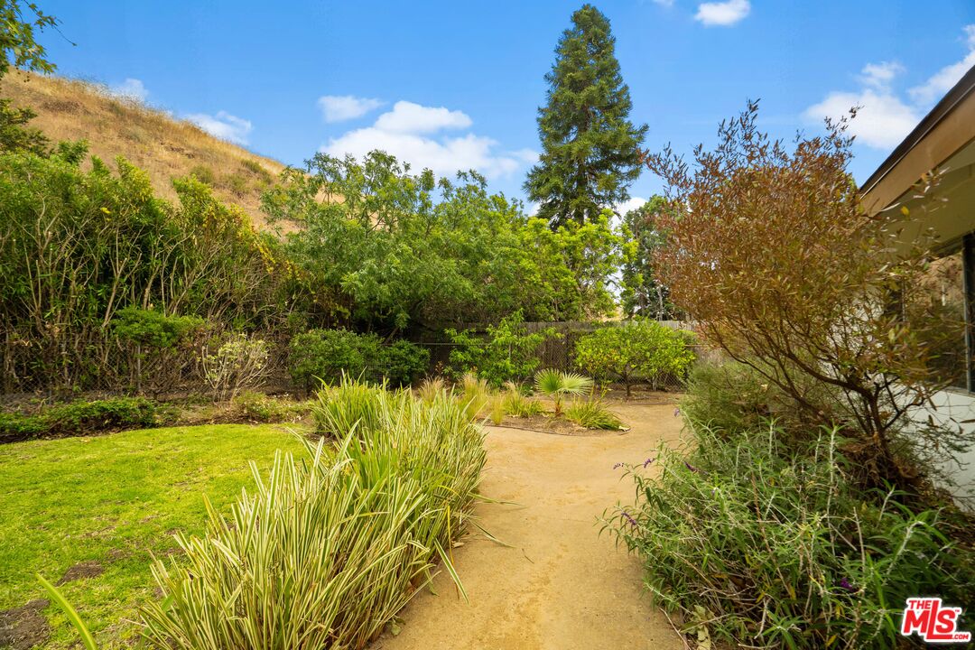 6164 Paseo Cyn Drive Malibu, CA 90265 - Photo 43 of 45 a view of a lake with a yard