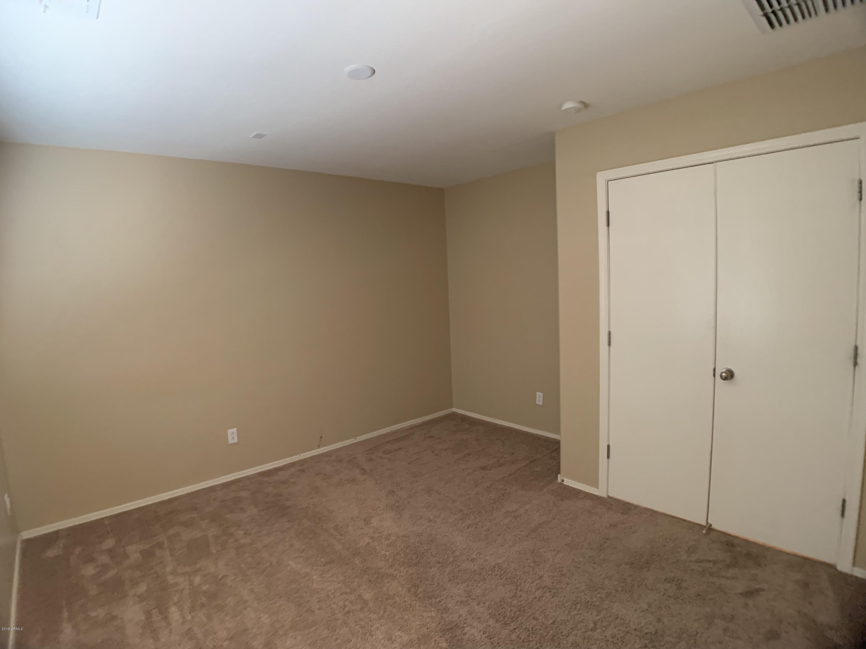 3952 East Morenci Road San Tan Valley, AZ 85143 - Photo 12 of 15 a view of an empty room