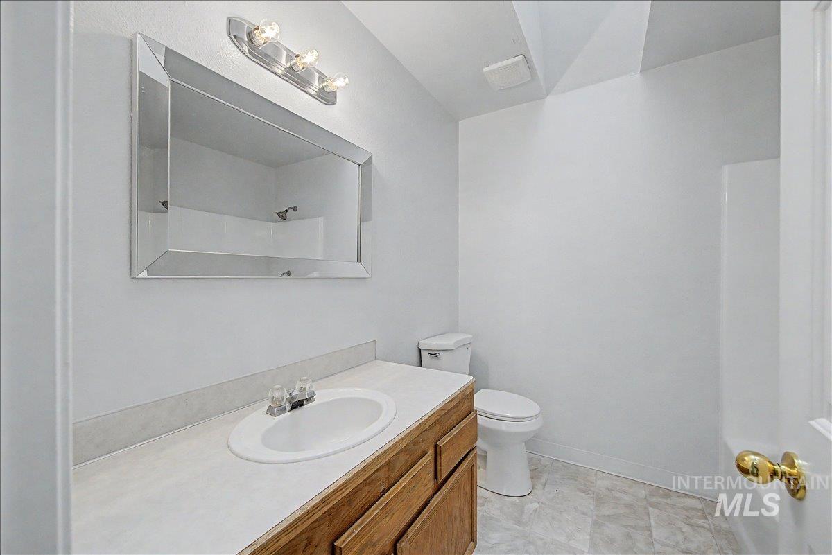 2501 West Hill Road Boise, ID 83702 - Photo 15 of 31 Bathroom featuring vanity and a shower
