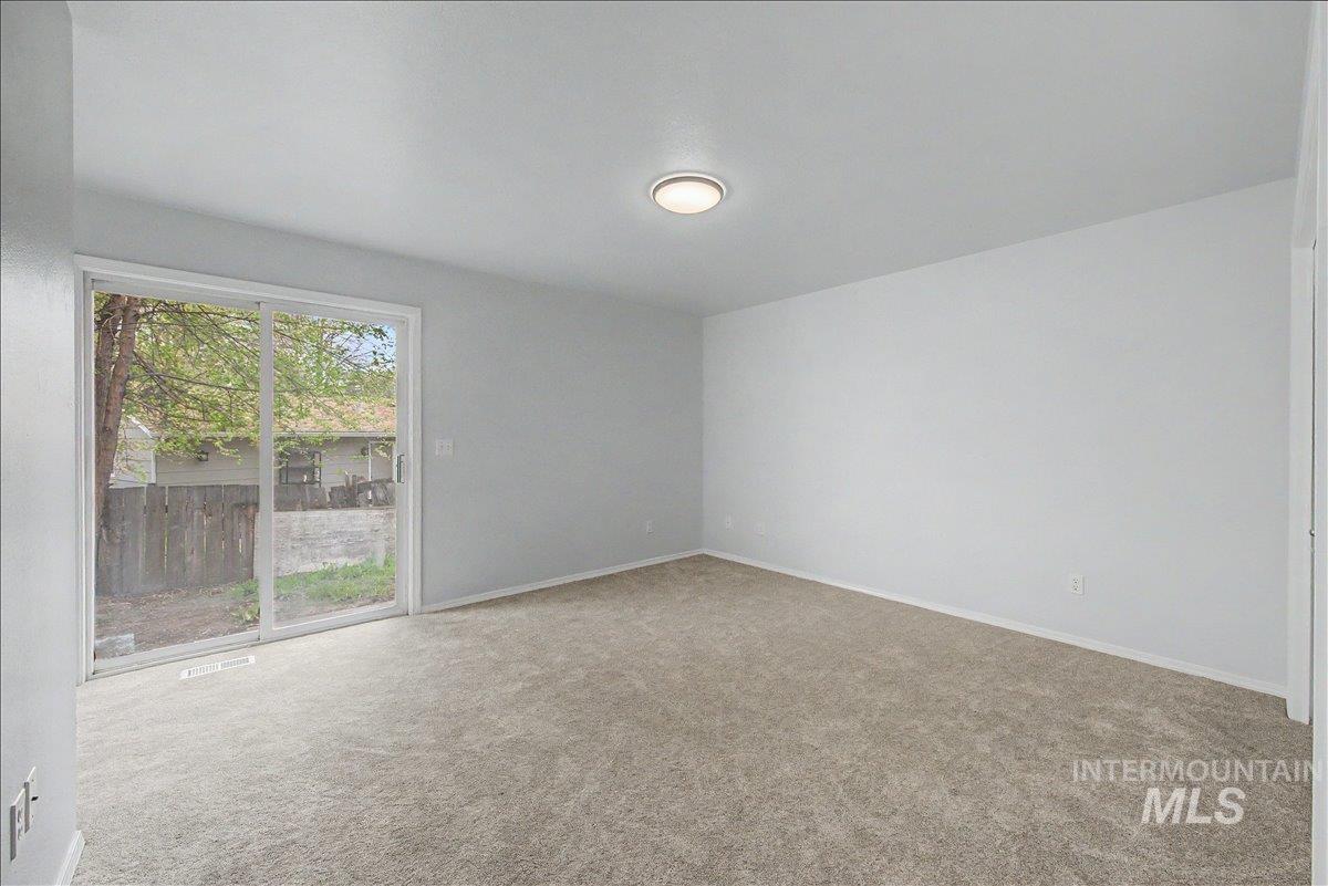 2501 West Hill Road Boise, ID 83702 - Photo 20 of 31 Carpeted empty room with baseboards