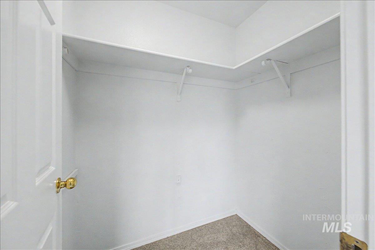 2501 West Hill Road Boise, ID 83702 - Photo 23 of 31 Walk in closet with carpet
