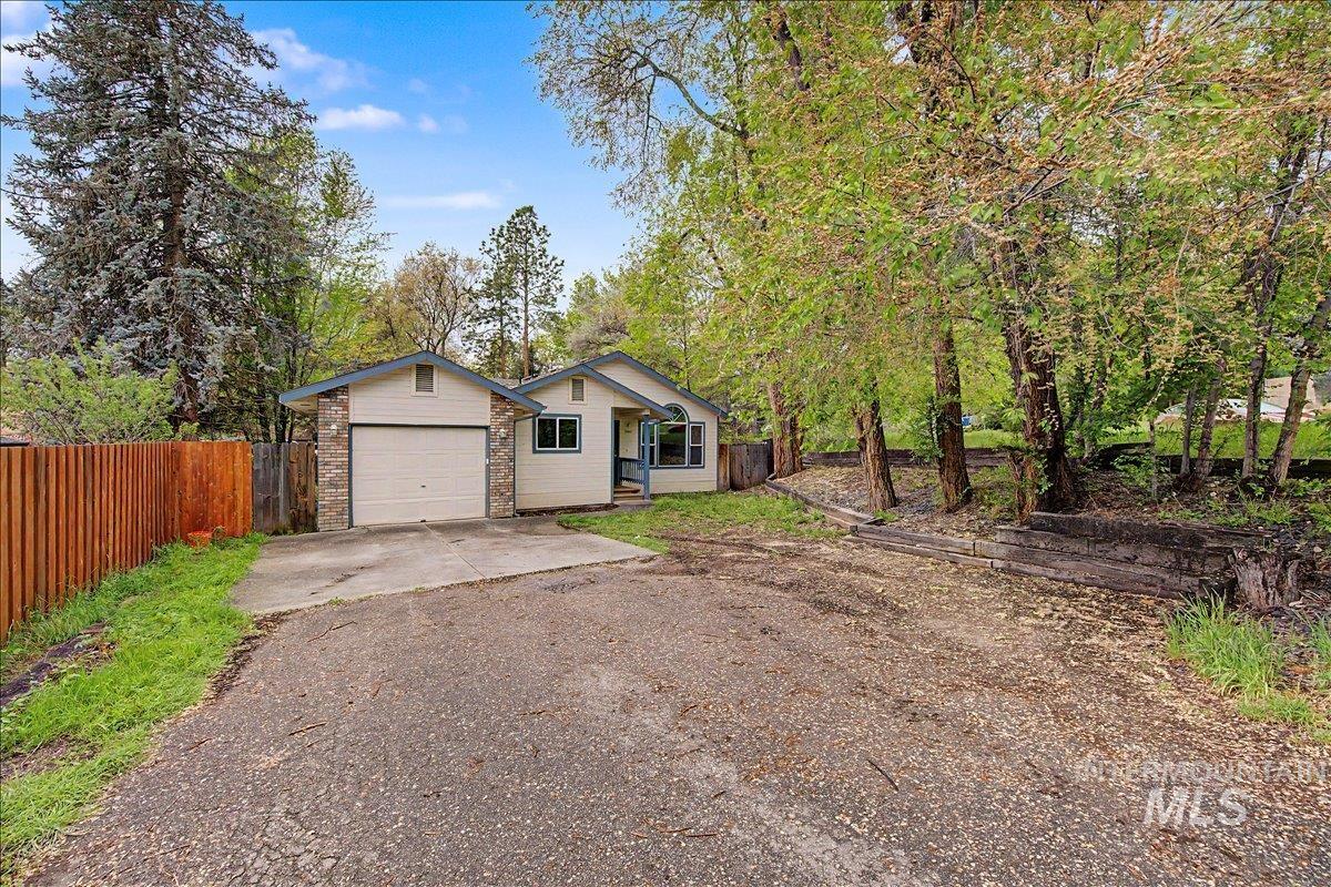 2501 West Hill Road Boise, ID 83702 - Photo 31 of 31 View of front facade featuring concrete driveway and brick siding