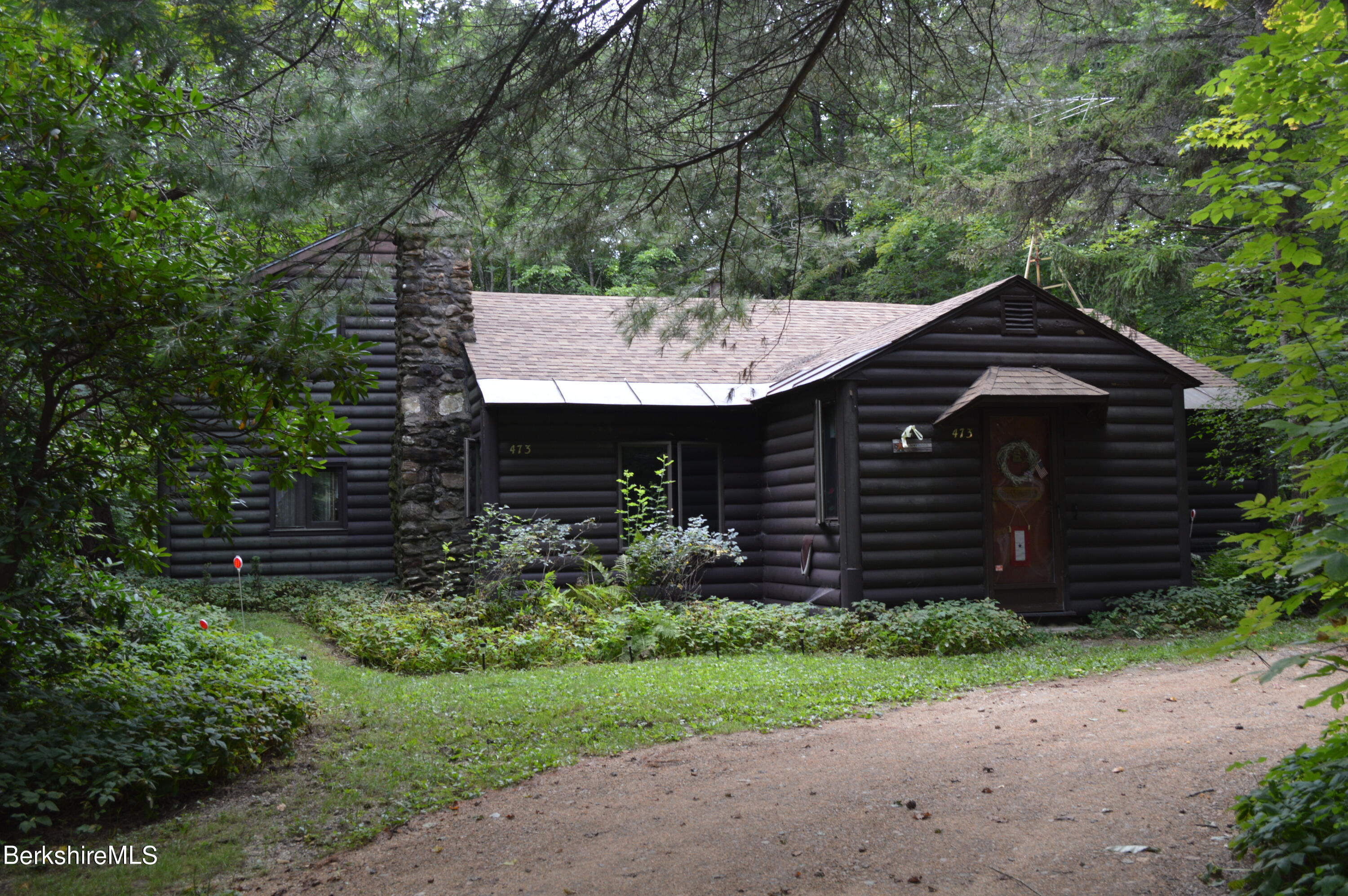 473 County Road Becket, MA 01223 - Photo 24 of 30 a front view of a house with garden