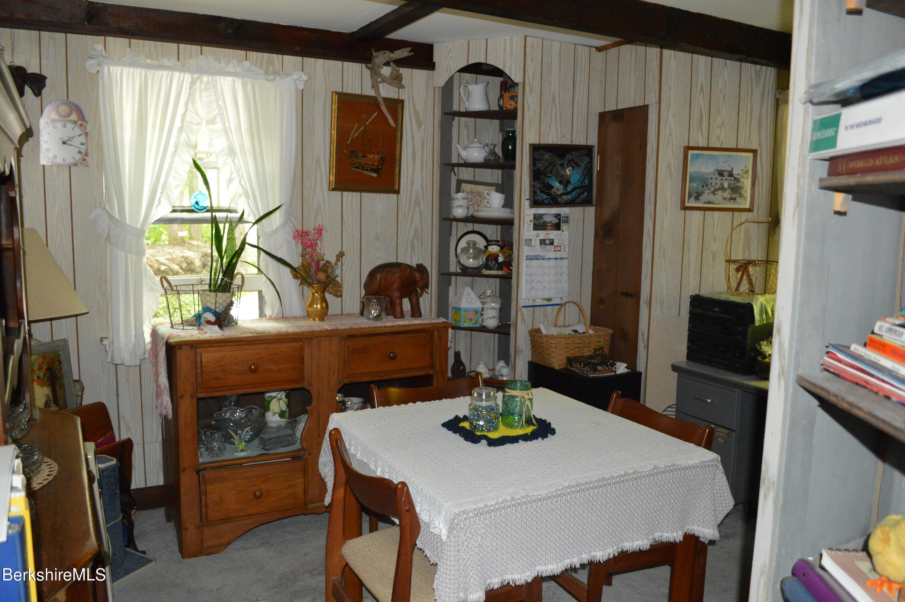 473 County Road Becket, MA 01223 - Photo 5 of 30 a view of kitchen and dining room with furniture