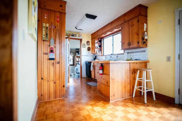 a view of livingroom with furniture and windows