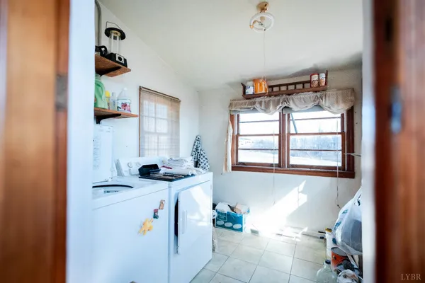 a bathroom with a sink and a window