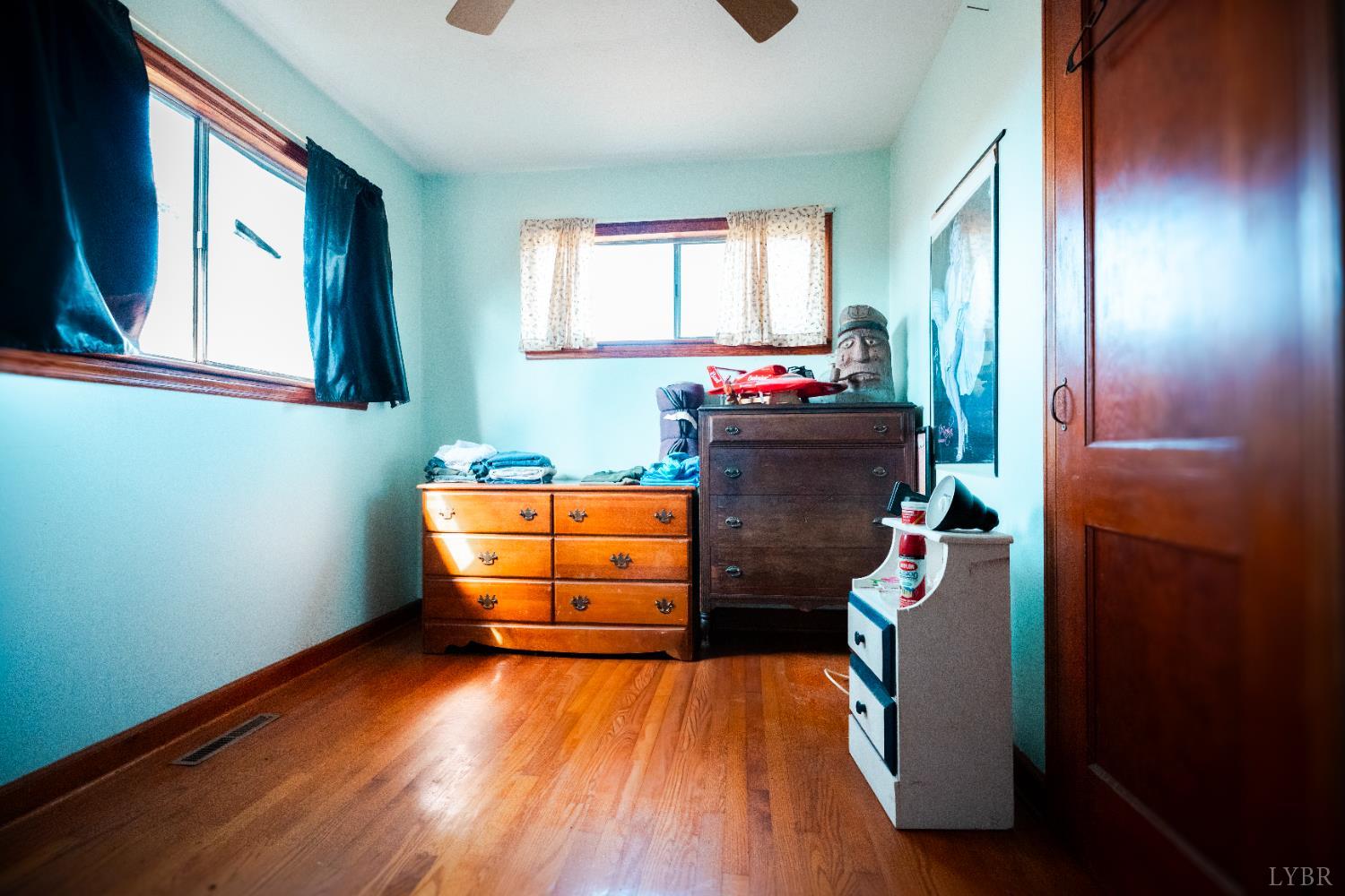 1228 Clover Creek Road Huddleston, VA 24104 - Photo 17 of 25 a room with wooden floor and window