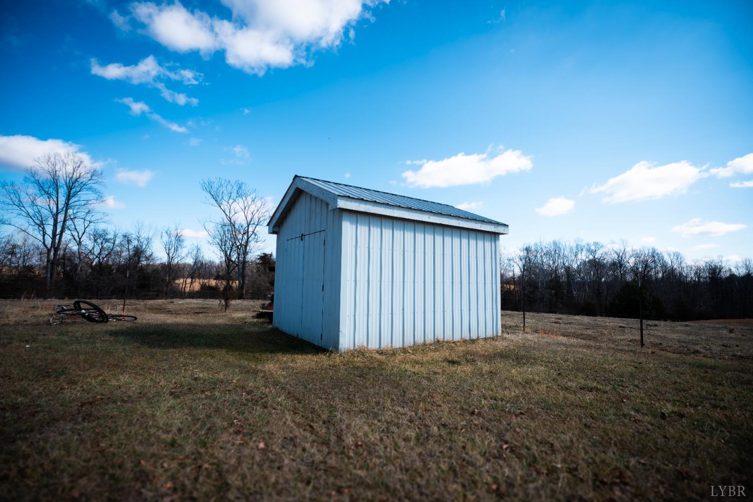 1228 Clover Creek Road Huddleston, VA 24104 - Photo 23 of 25 a view of a backyard