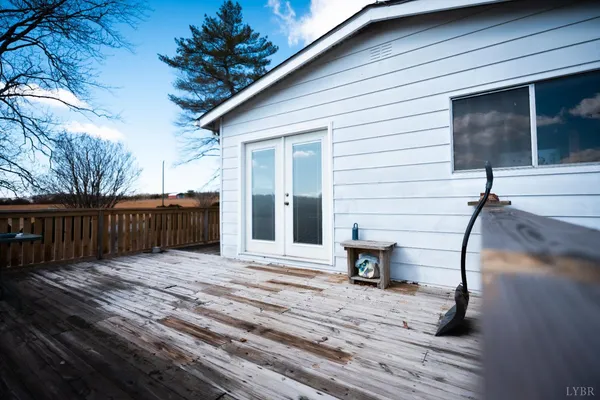 a view of a chairs setting on the deck