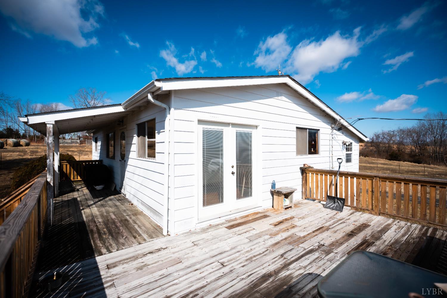 1228 Clover Creek Road Huddleston, VA 24104 - Photo 7 of 25 a outdoor space with balcony