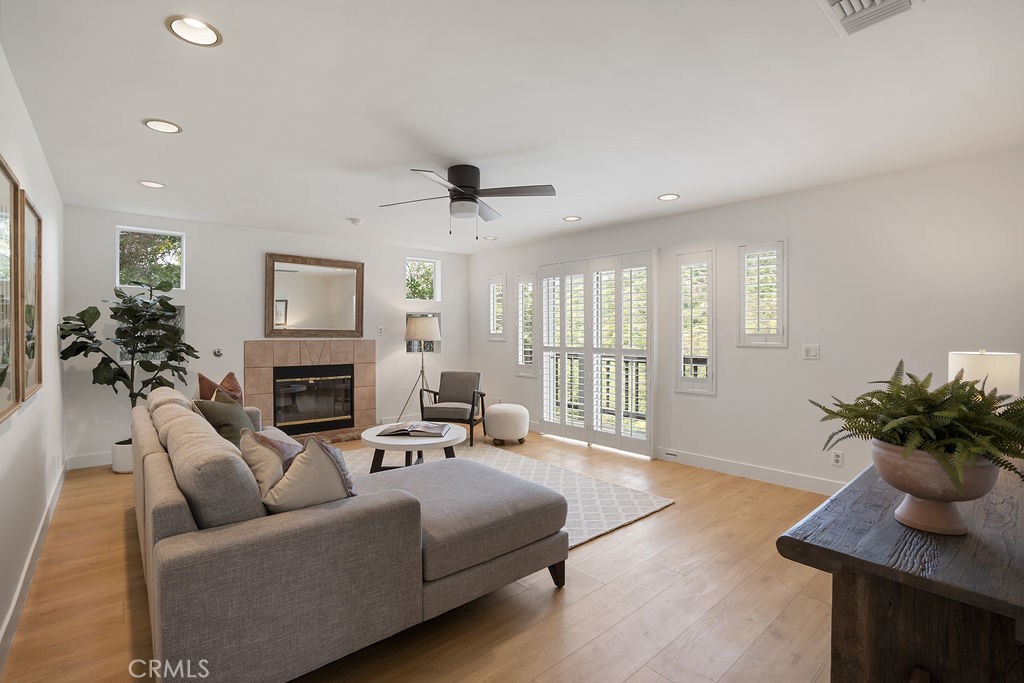 235 Spinks Canyon Road Duarte, CA 91010 - Photo 15 of 50 a living room with furniture fireplace and a potted plant