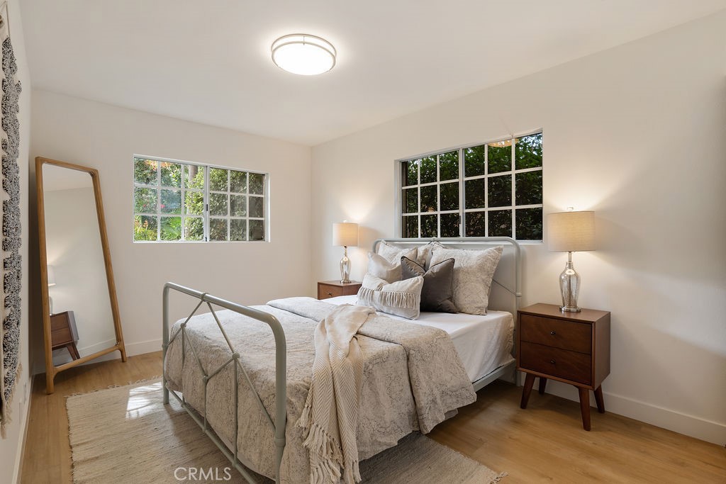 235 Spinks Canyon Road Duarte, CA 91010 - Photo 19 of 50 a bedroom with a bed and a window