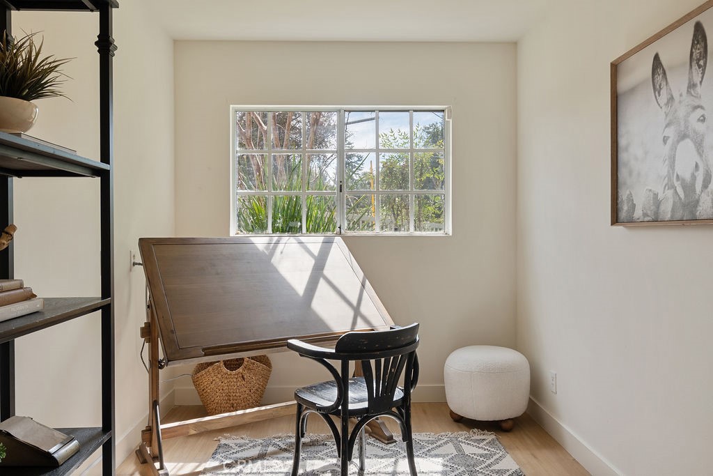 235 Spinks Canyon Road Duarte, CA 91010 - Photo 20 of 50 a view of a dining room with furniture and wooden floor