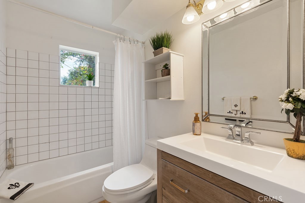 235 Spinks Canyon Road Duarte, CA 91010 - Photo 22 of 50 a bathroom with a sink a toilet and shower