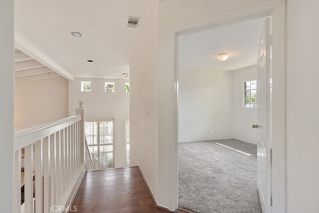 235 Spinks Canyon Road Duarte, CA 91010 - Photo 23 of 50 a view of a hallway with wooden floor