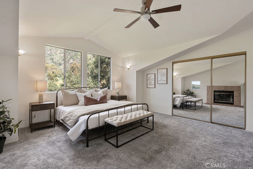 235 Spinks Canyon Road Duarte, CA 91010 - Photo 29 of 50 a bedroom with a bed couch and a window