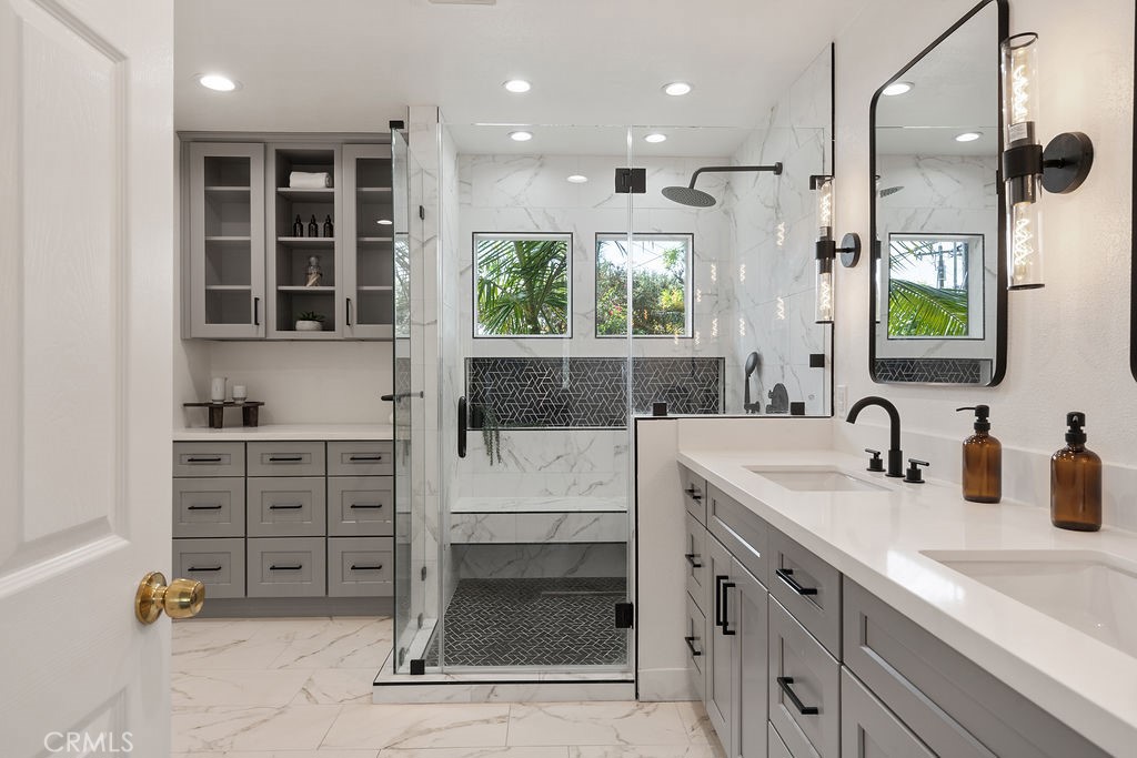 235 Spinks Canyon Road Duarte, CA 91010 - Photo 30 of 50 a bathroom with a sink double vanity and a shower