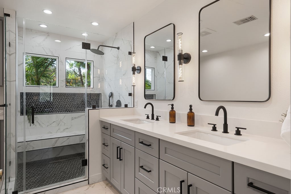 235 Spinks Canyon Road Duarte, CA 91010 - Photo 31 of 50 a bathroom with a double vanity sink mirror and double