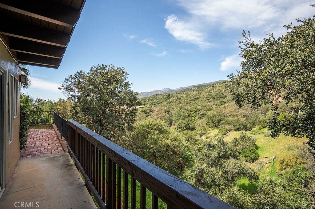 235 Spinks Canyon Road Duarte, CA 91010 - Photo 40 of 50 a balcony with trees in front of it
