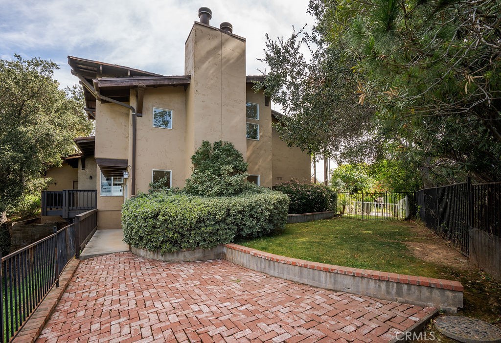 235 Spinks Canyon Road Duarte, CA 91010 - Photo 44 of 50 a house with trees in front of it