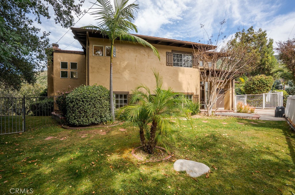 235 Spinks Canyon Road Duarte, CA 91010 - Photo 45 of 50 a view of a house with a yard