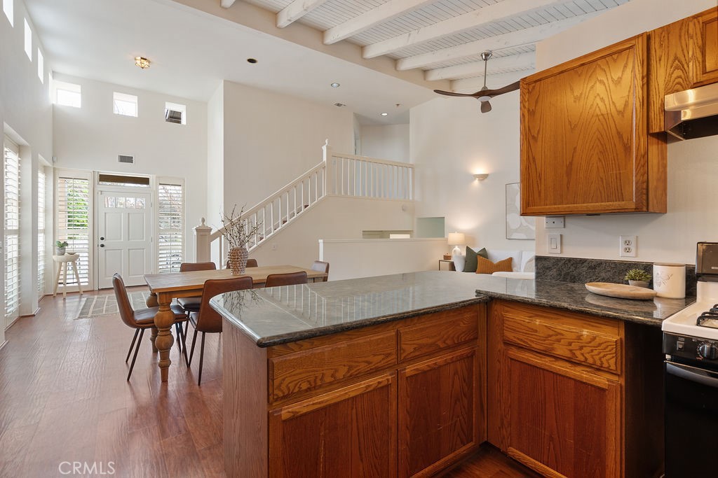 235 Spinks Canyon Road Duarte, CA 91010 - Photo 10 of 50 a kitchen with stainless steel appliances granite countertop a sink a stove and a wooden floors
