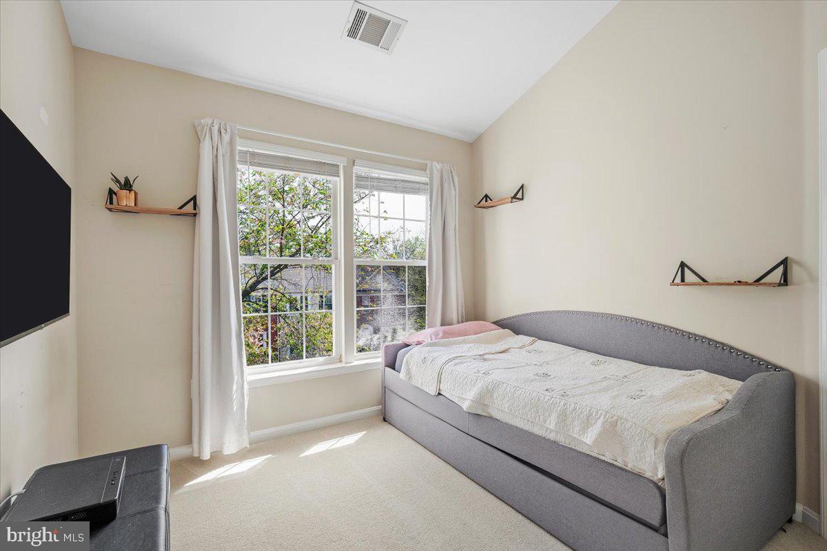 22019 Box Car Square Sterling, VA 20166 - Photo 21 of 31 a bedroom with a large bed and a tv