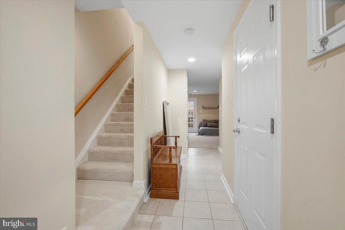 22019 Box Car Square Sterling, VA 20166 - Photo 23 of 31 a view of entryway and hall with a front door