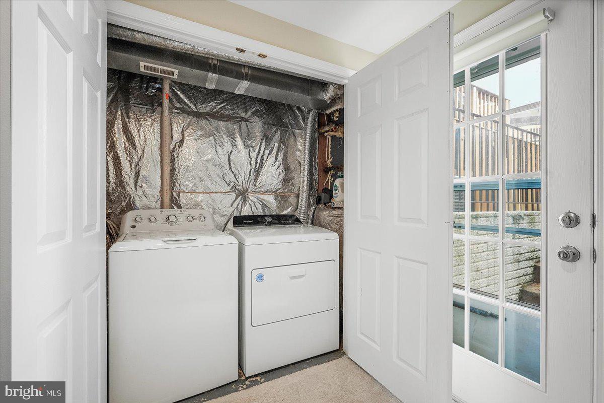 22019 Box Car Square Sterling, VA 20166 - Photo 28 of 31 a utility room with dryer and washer