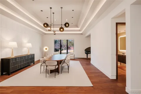 a view of a dining room with furniture window and outside view