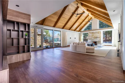 a living room with furniture rug and window