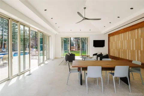 a bedroom with a bed lamp closet and window