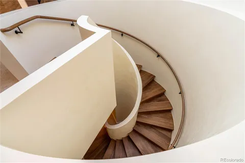 a bathroom with a tub and shower